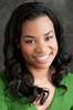rheaheadshotgreen-1.jpg