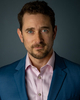 Christopher_Hwerbert_headshot_2023_blue_suit_print.jpeg